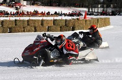 Johnson and Doelzol hitting Turn Four
