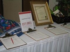 Items for the silent auction were donated by City Grill and Evolutions in Design (Wausau, Wis.), Johanna May's Fine Teas (Weston, Wis.), Choua Lo, and Kao and Lee Lor.