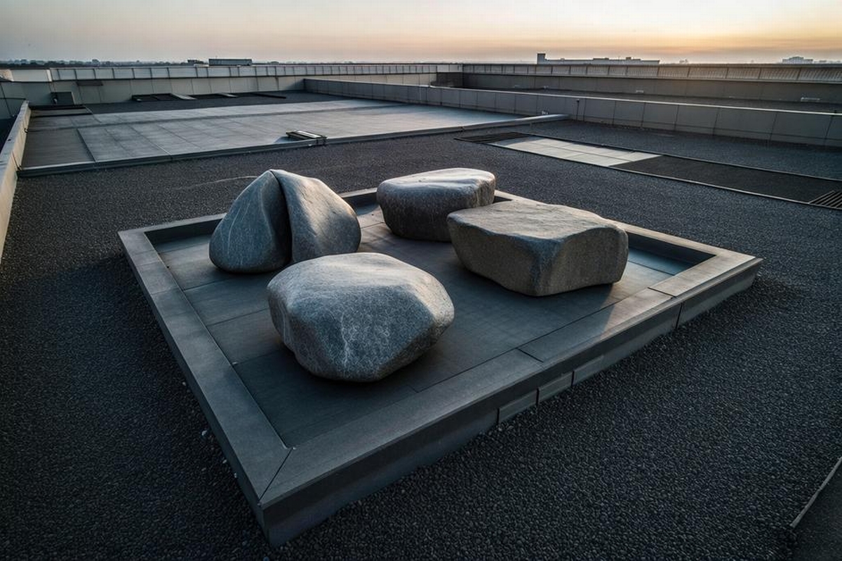 Why Do Buildings Have Rocks on the Roof? Purpose and Benefits Explained