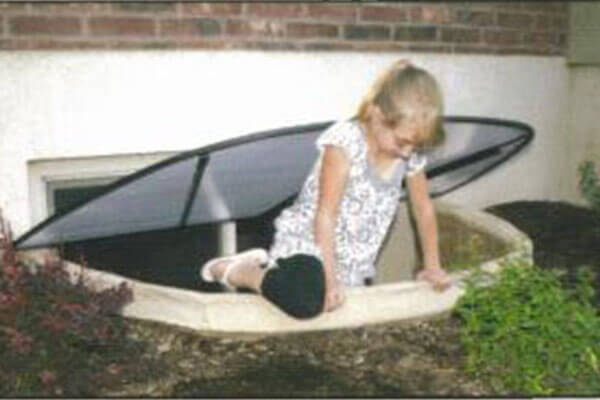 Girl In Window Well