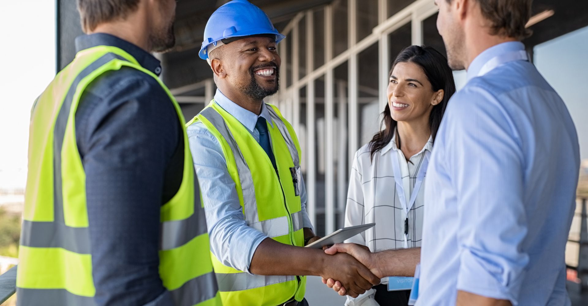 A contractor speaking with building owners