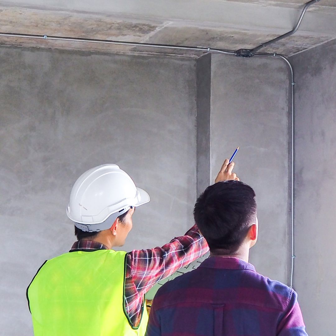 A contractor speaking with a building owner